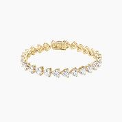 Heart-cut moissanite tennis bracelet in yellow gold vermeil, closed view.