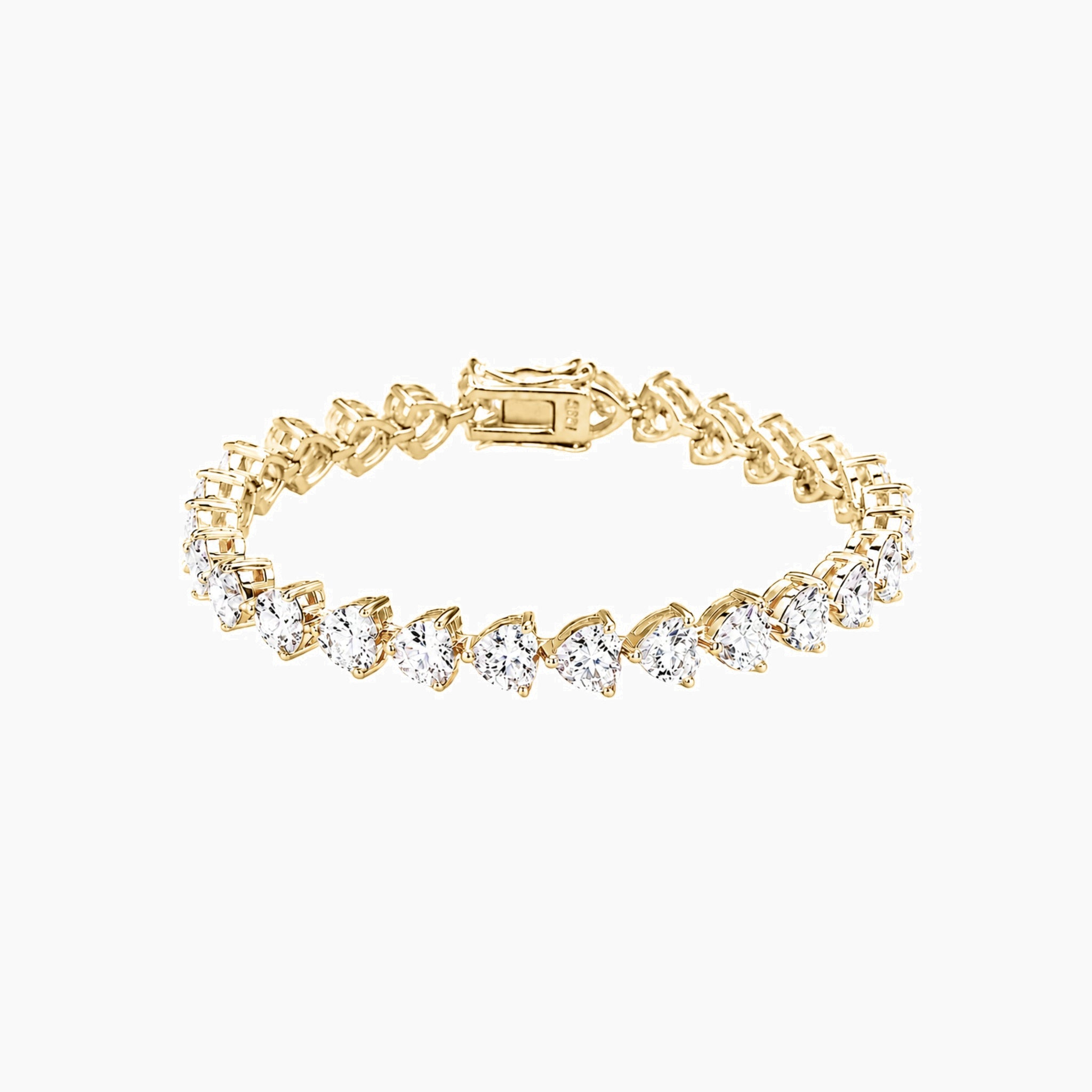 Heart-cut moissanite tennis bracelet in yellow gold vermeil, closed view.