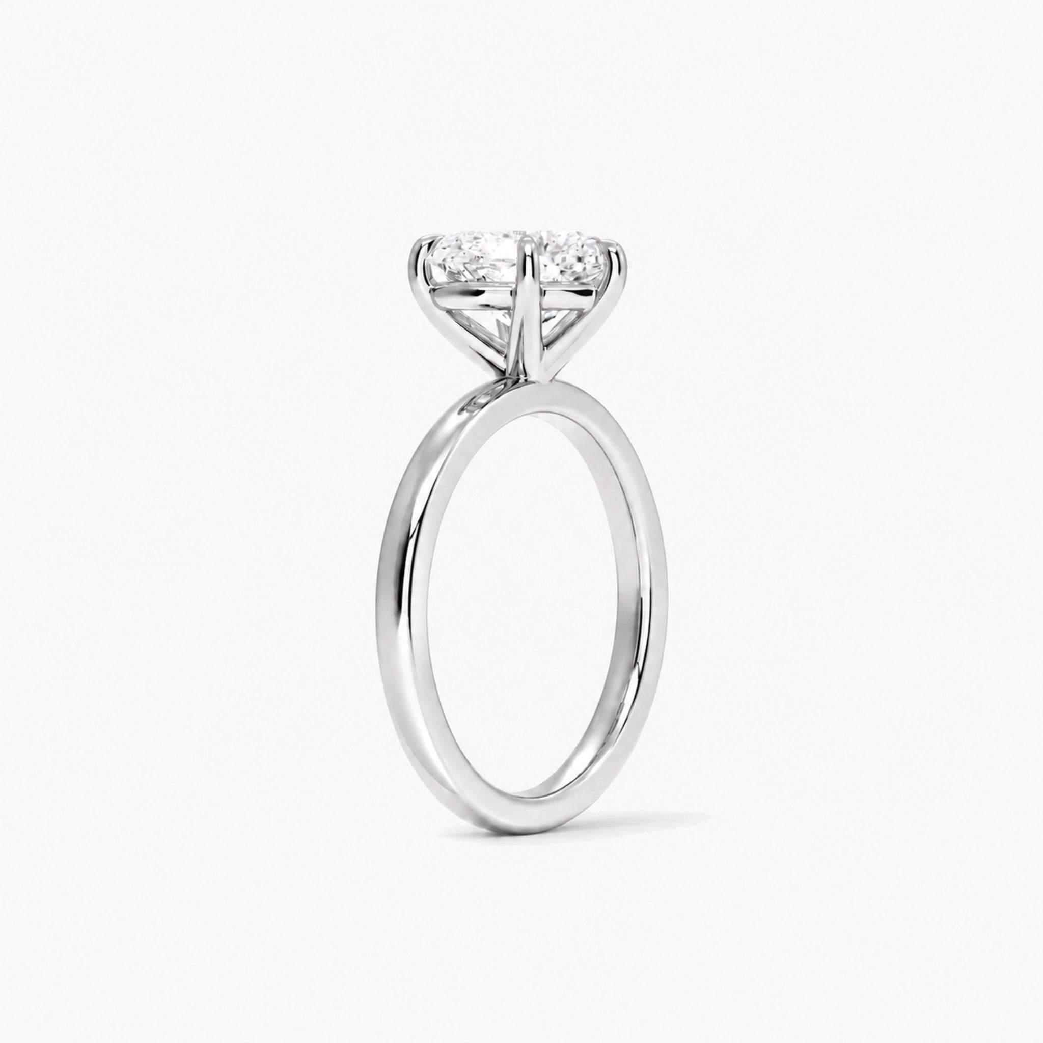 Heart-Cut Moissanite Solitaire Ring in white gold, side view