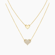 Layered pavé moissanite heart necklace in yellow gold vermeil, full product view.