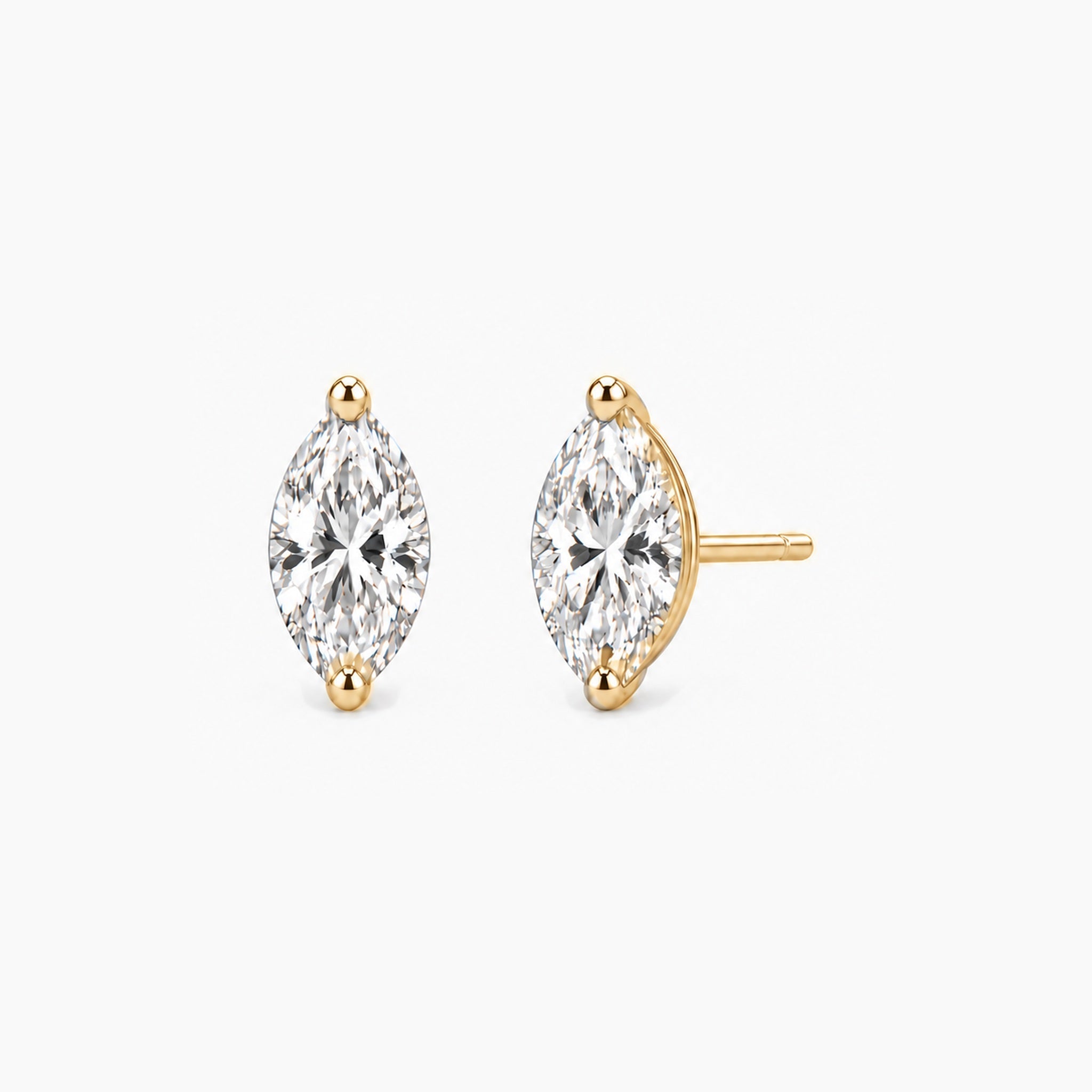 Marquise-cut lab-grown diamond stud earrings in 14k yellow gold, front and three-quarter views.