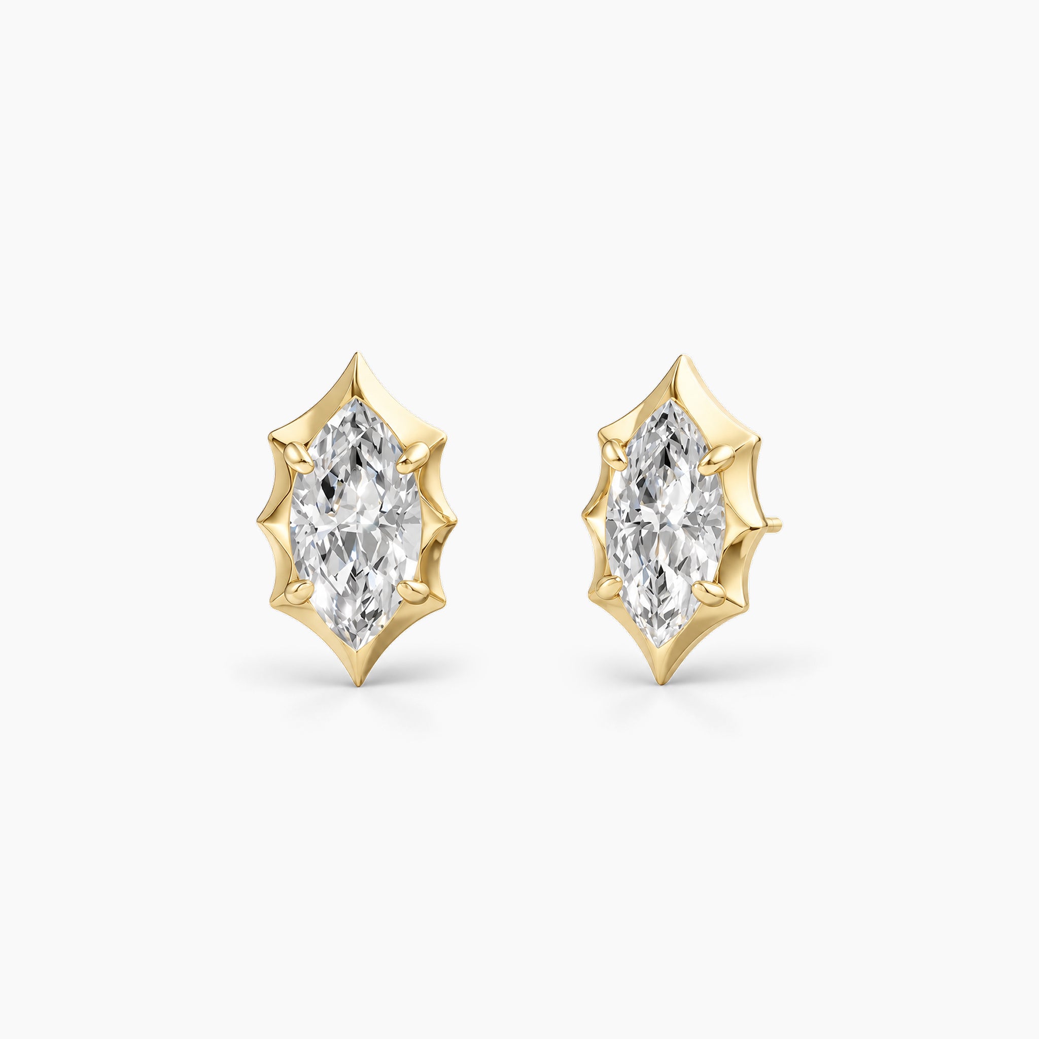 Marquise-cut moissanite bezel-prong stud earrings in 18k yellow gold vermeil, front and angled views.
