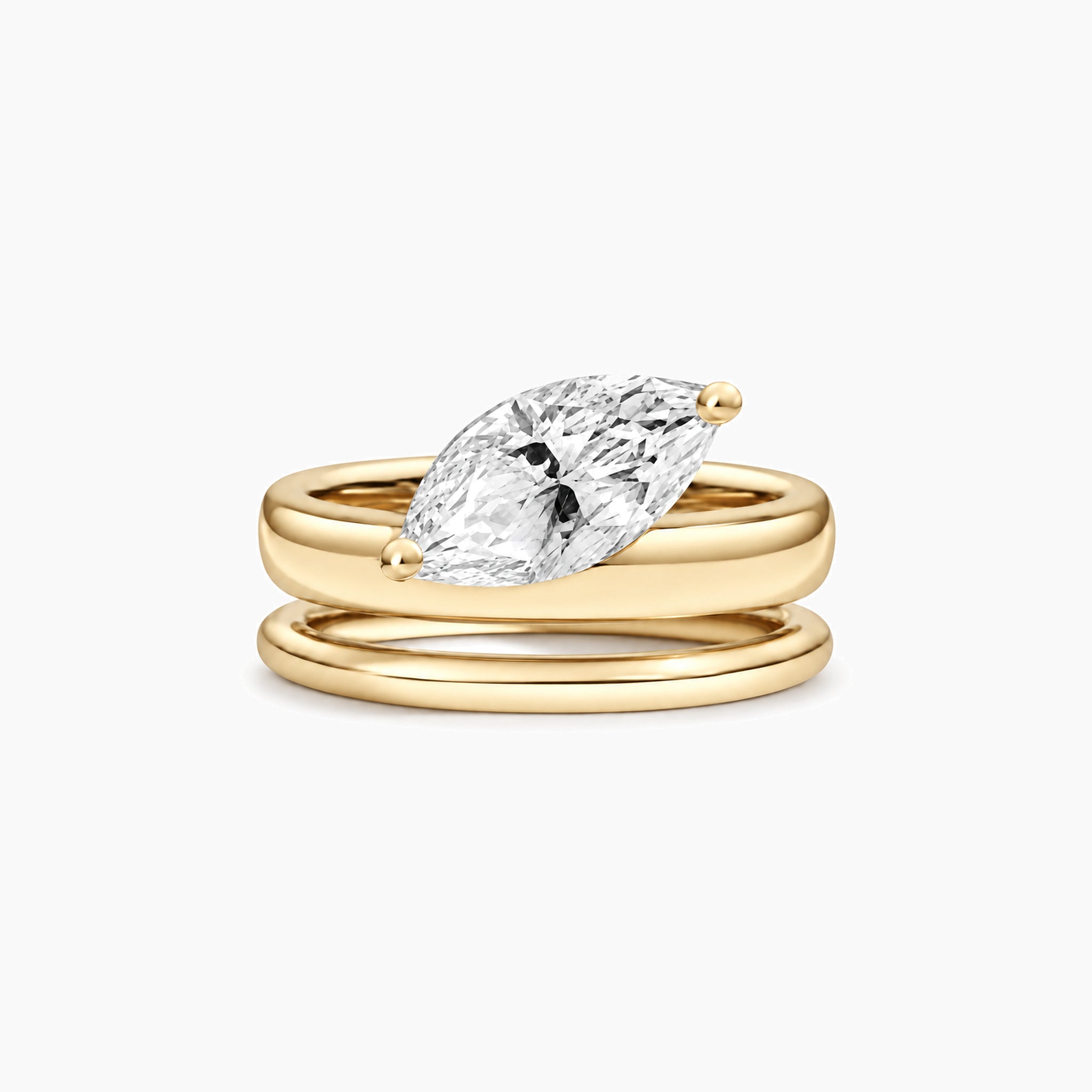 Marquise-cut moissanite double-band solitaire ring in yellow gold vermeil, front view.