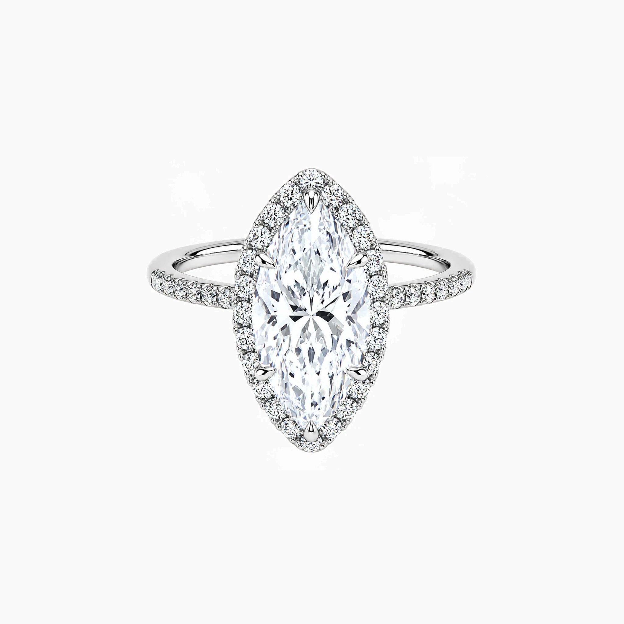 Marquise-cut moissanite halo ring with pavé band in white gold vermeil, front view.