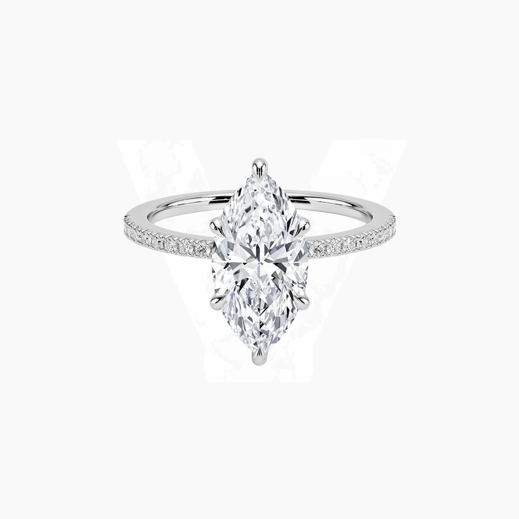Marquise-cut moissanite hidden halo ring with pavé band in white gold vermeil, front view.