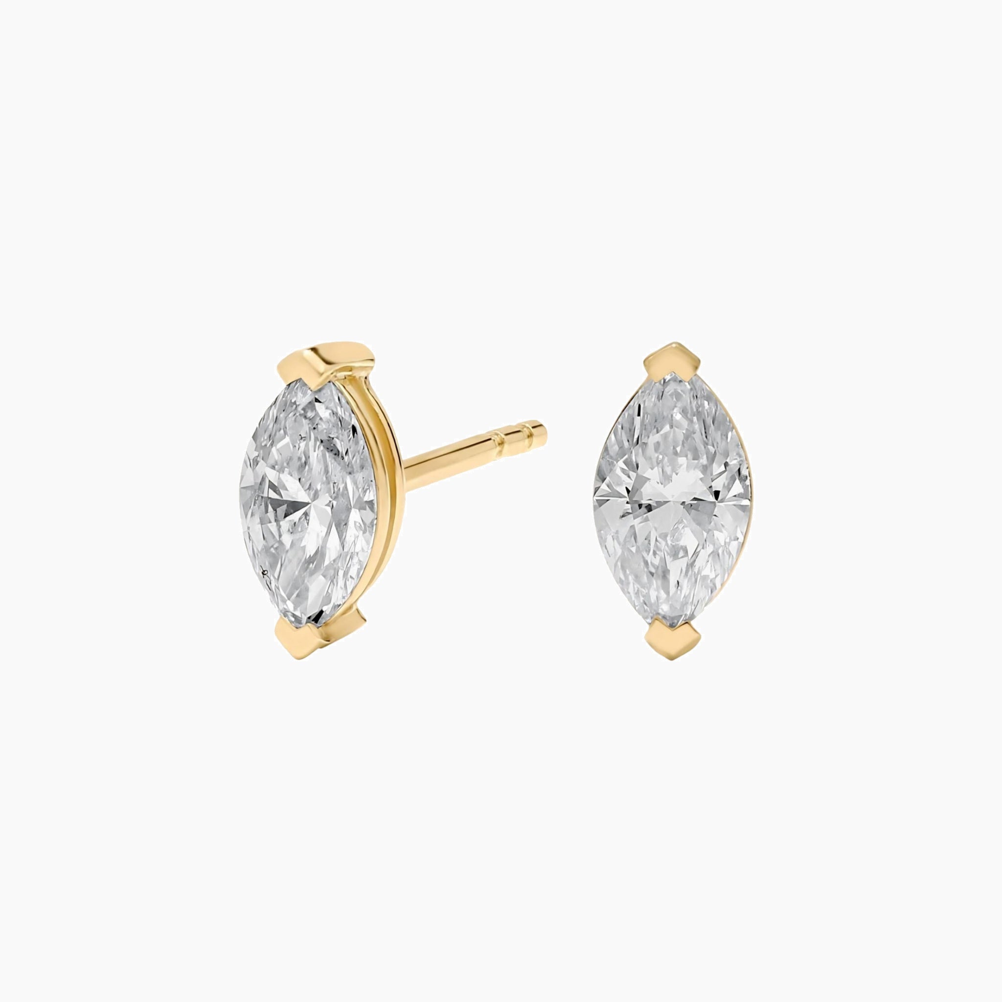 Marquise-cut moissanite stud earrings in yellow gold vermeil, front and side views.