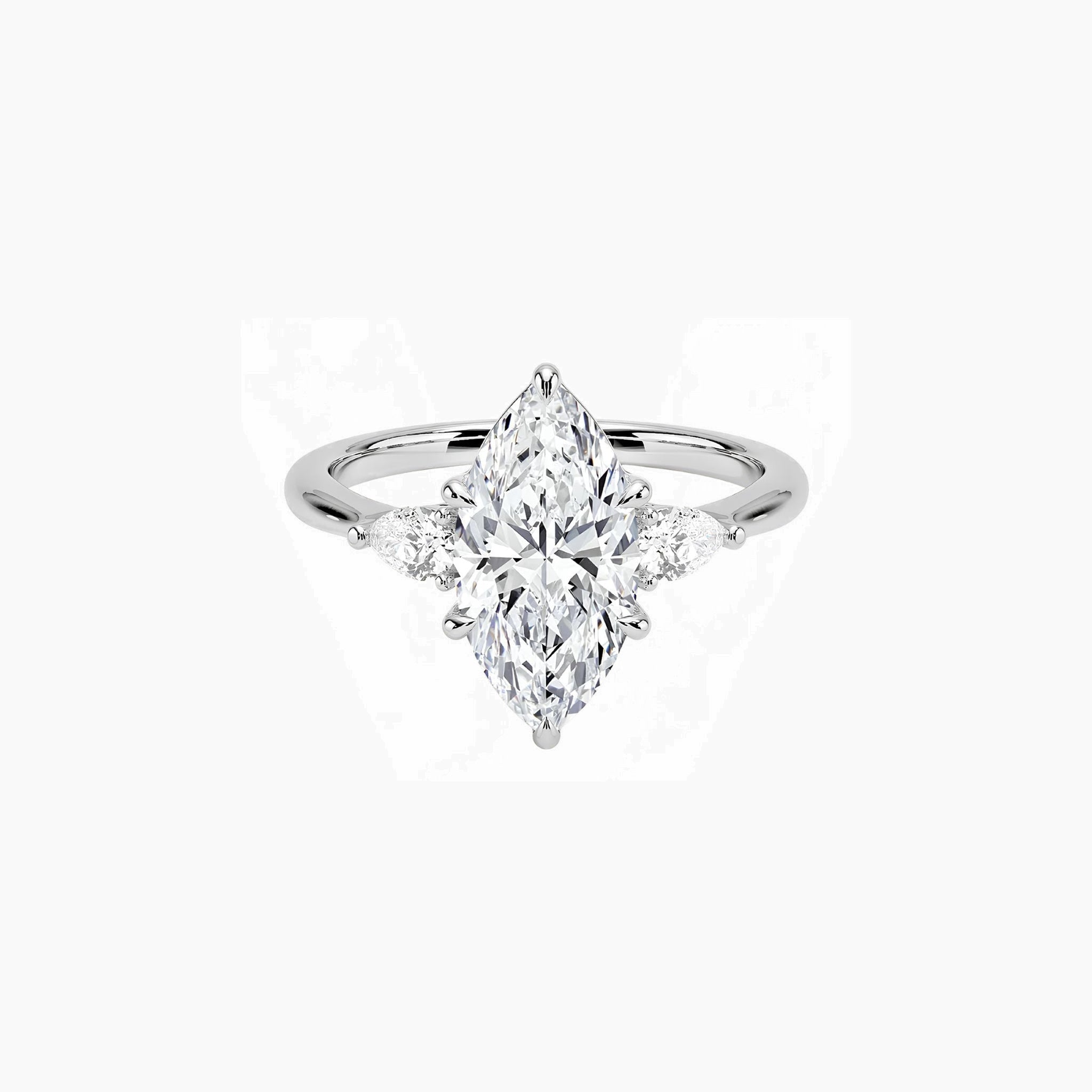 Marquise-cut moissanite three-stone ring in white gold vermeil, front view.