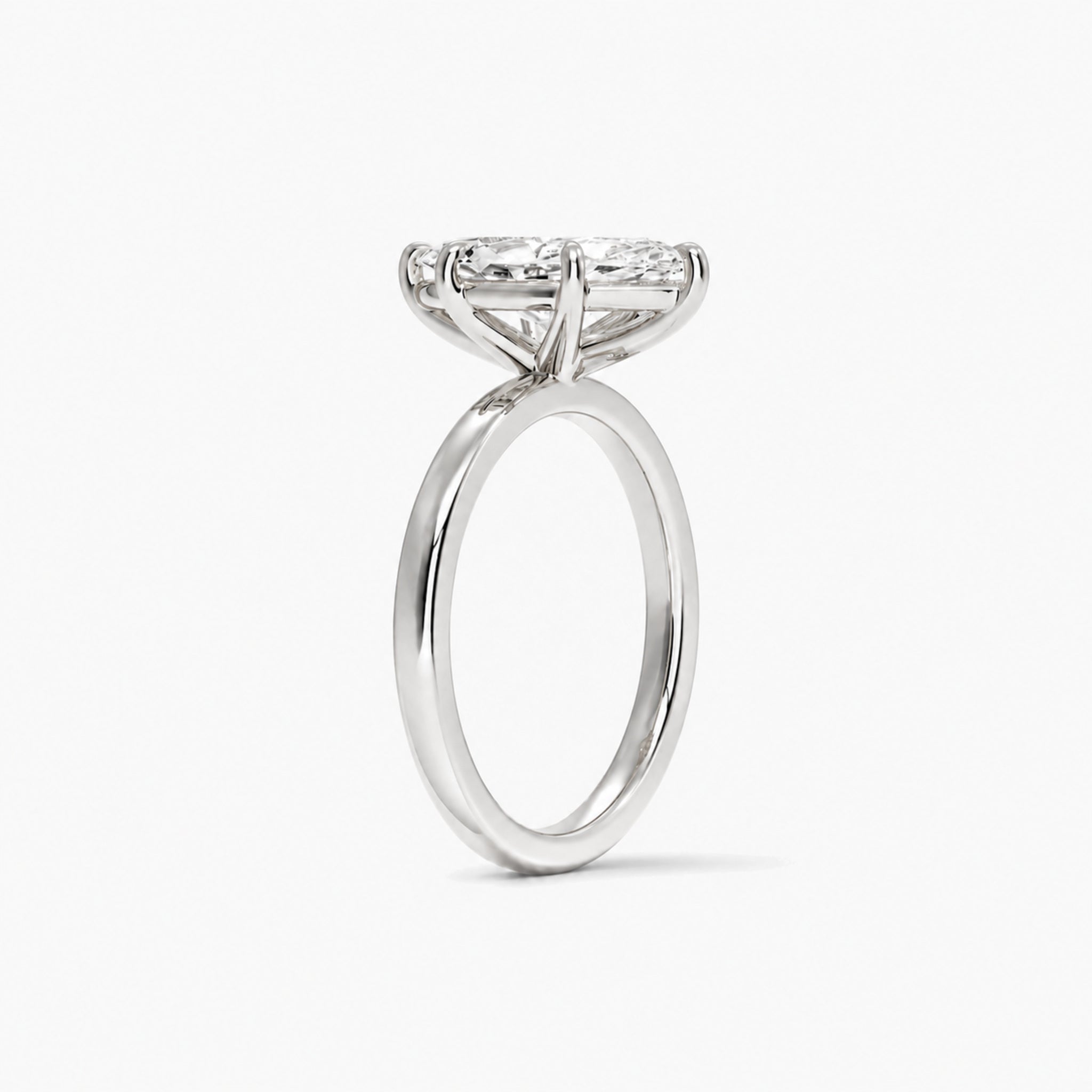 Marquise-cut moissanite solitaire ring in white gold vermeil, side view