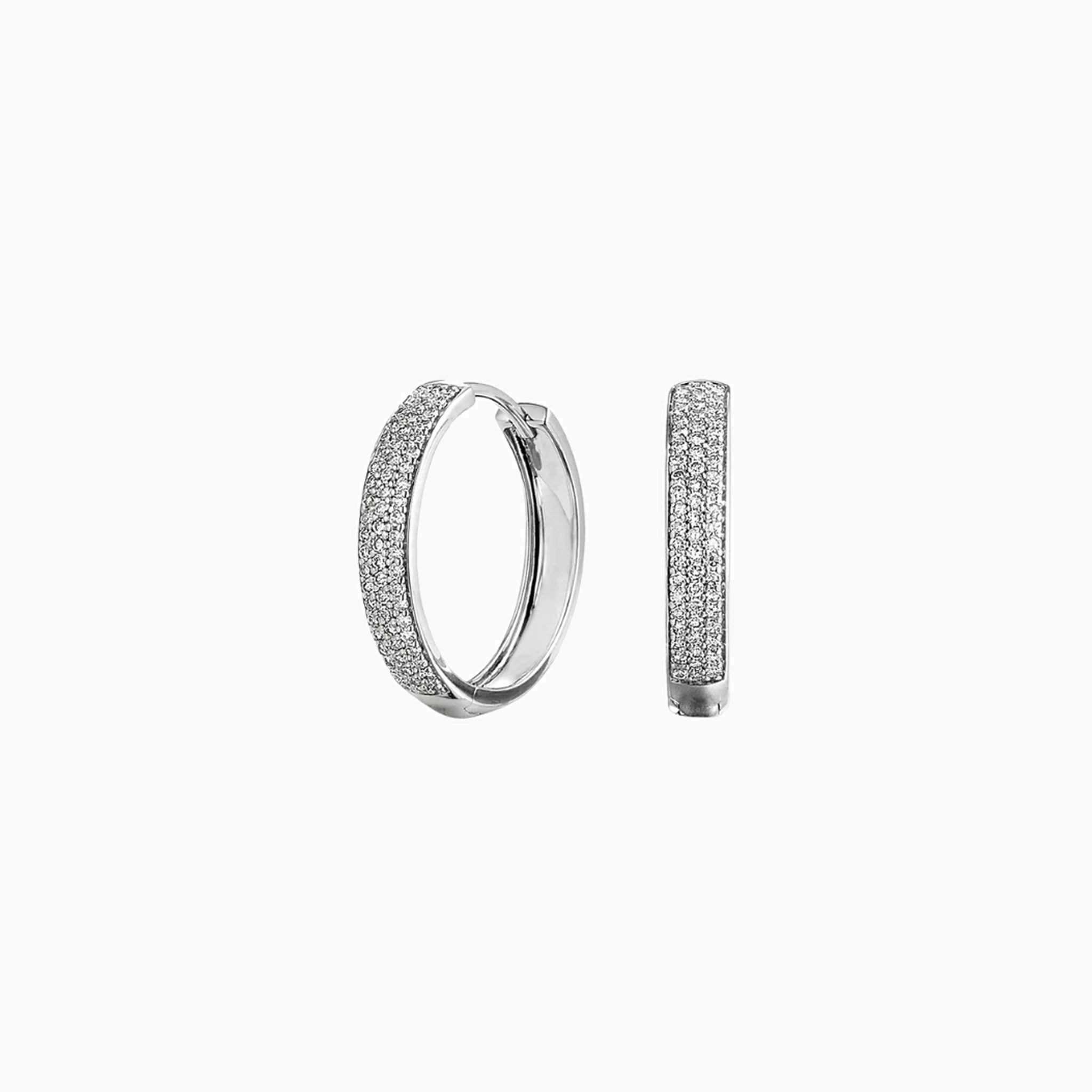 Medium bold pavé moissanite hoop earrings in white gold vermeil, front and side views.