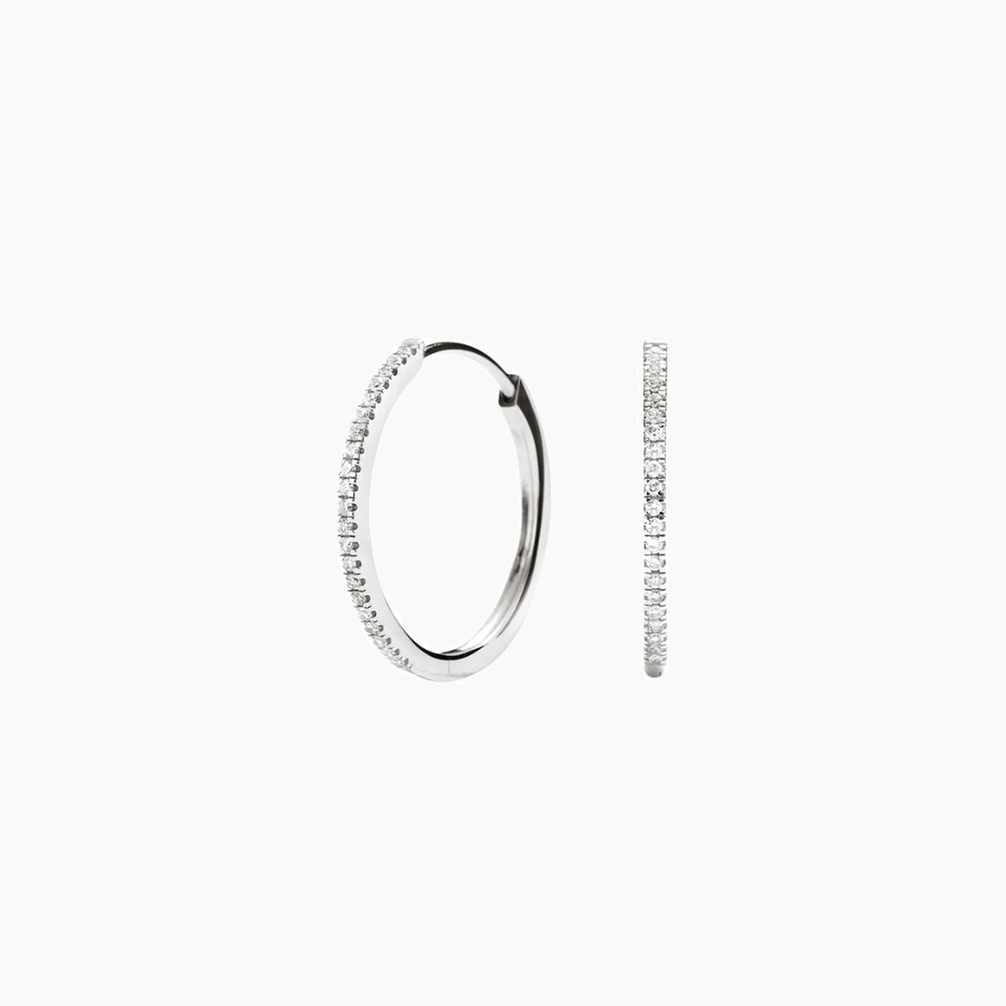 Medium pavé moissanite hoop earrings in white gold vermeil, front and side views.
