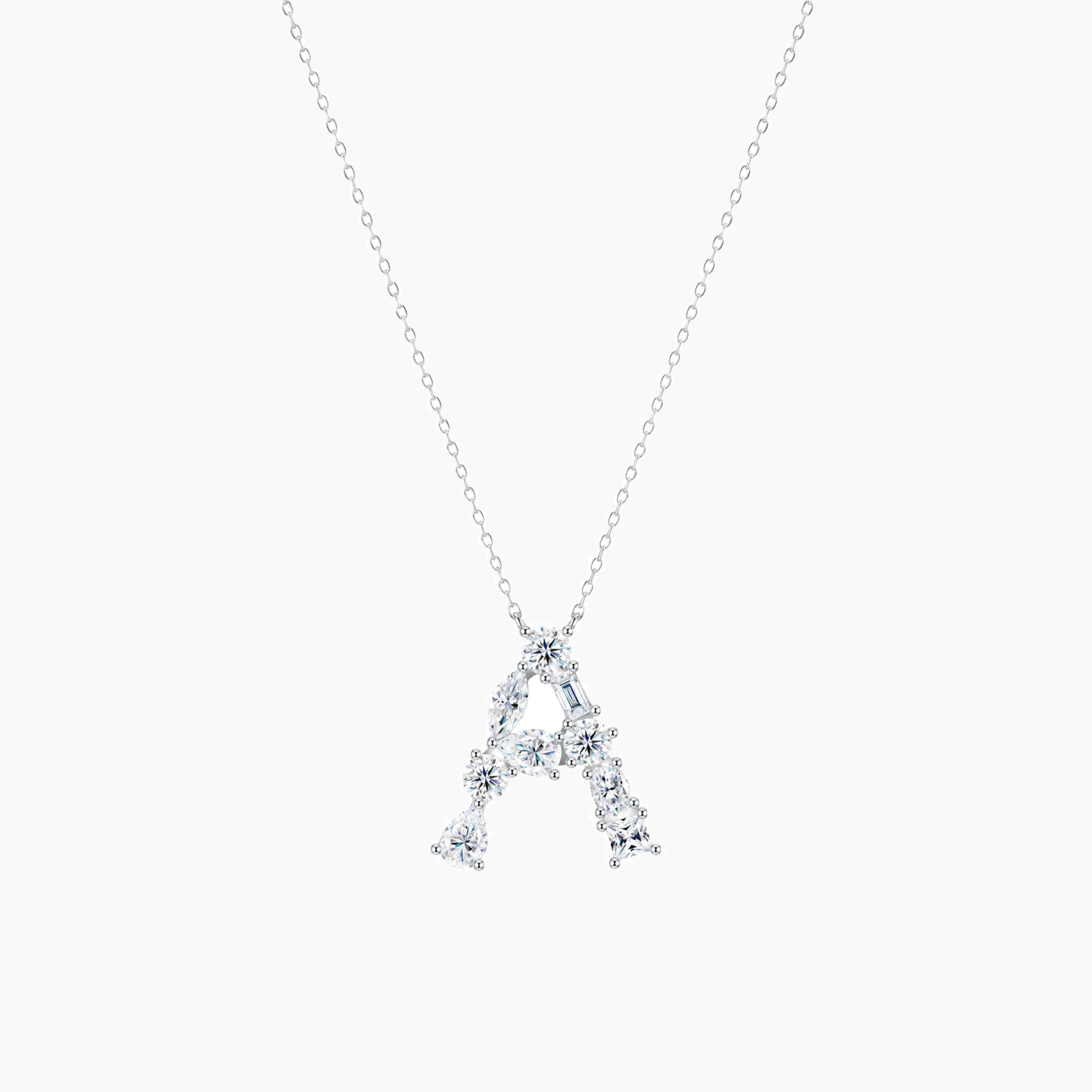 Mixed-shape moissanite initial necklace in white gold vermeil, full product view.