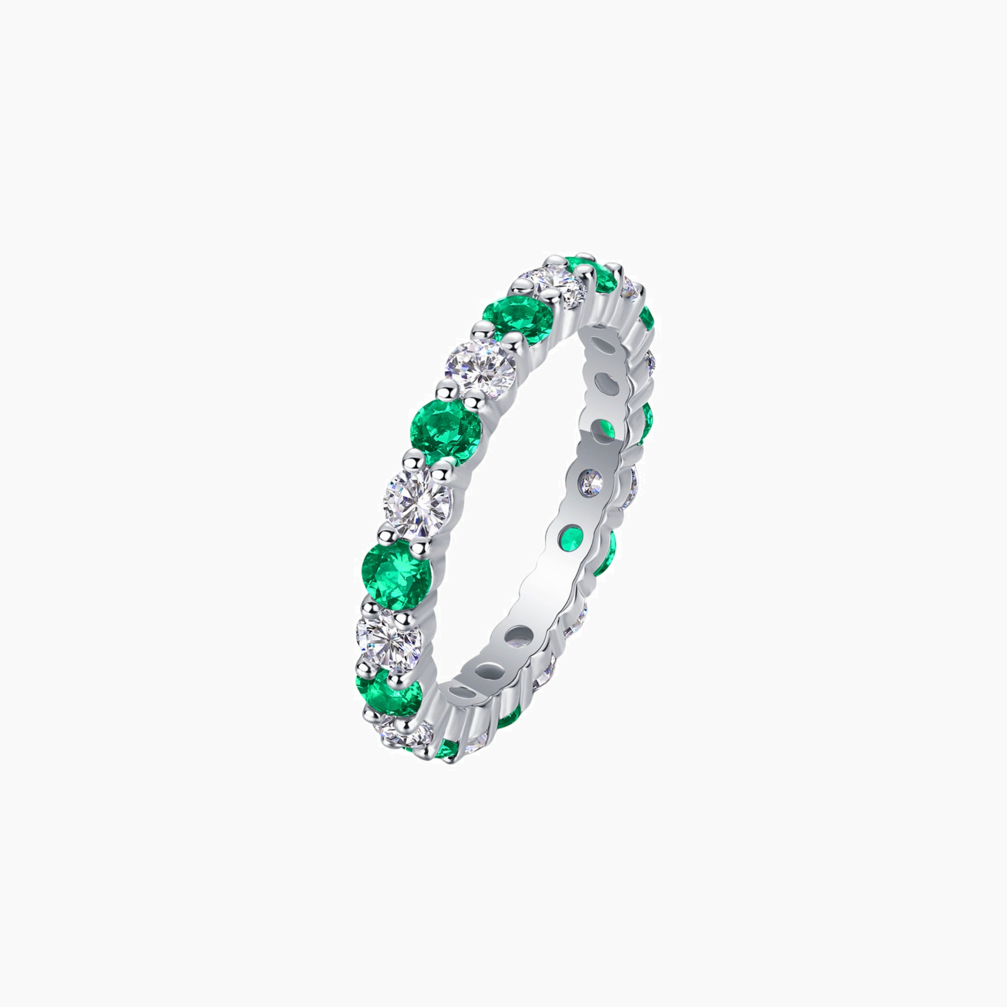 Moissanite and lab-grown emerald eternity ring in white gold vermeil, front view.
