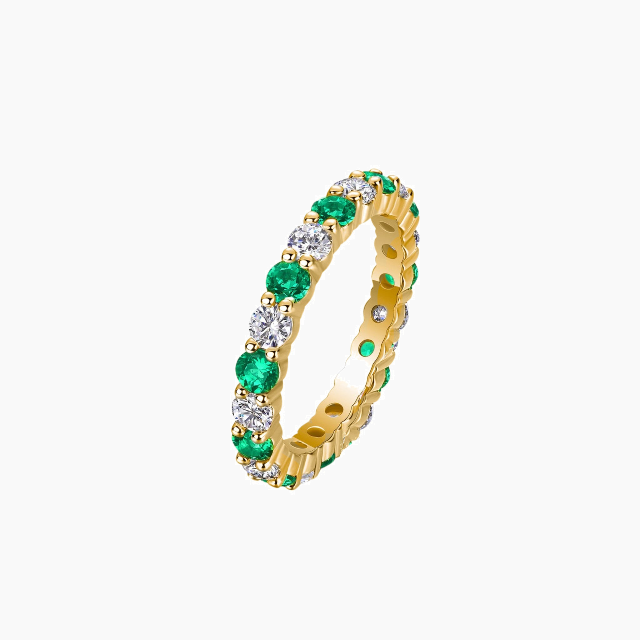 Moissanite and lab-grown emerald eternity ring in yellow gold vermeil, front view.