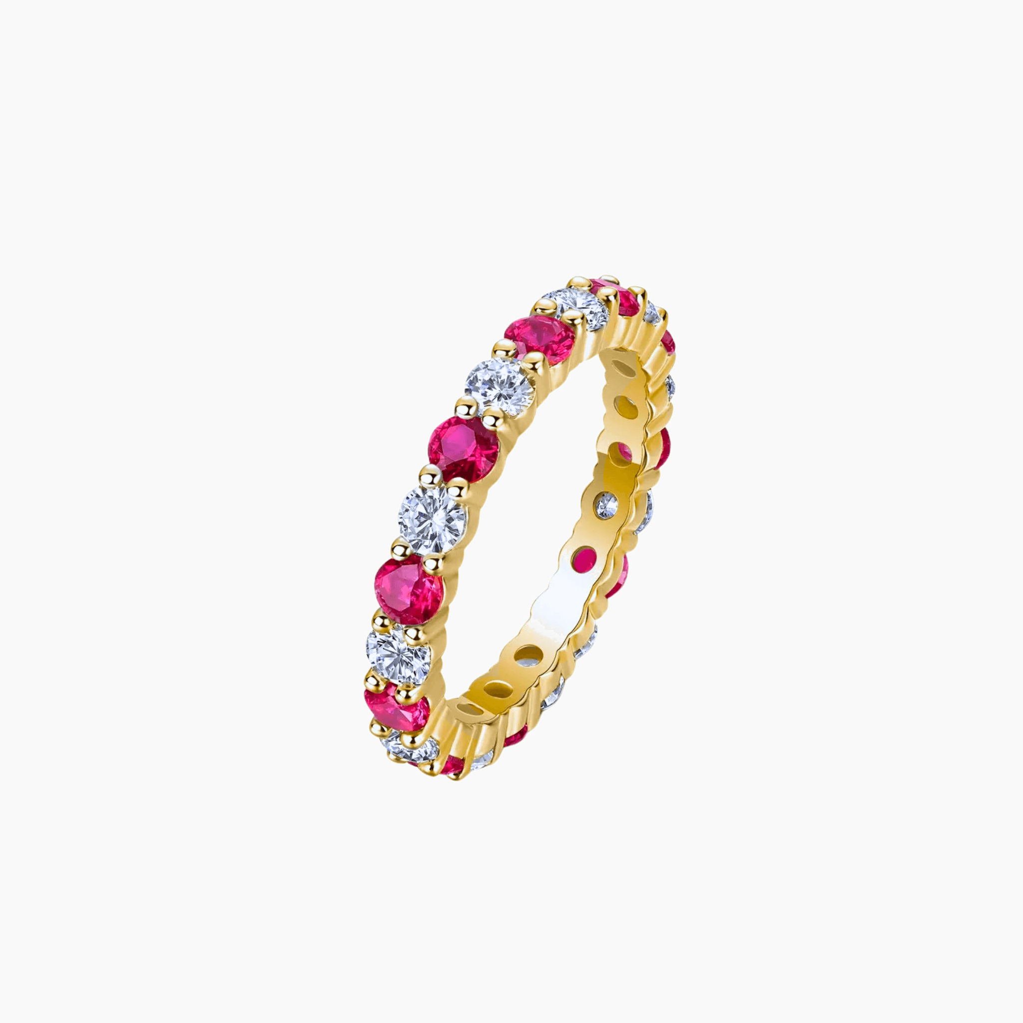 Moissanite and lab-grown ruby eternity ring in yellow gold vermeil, front view.