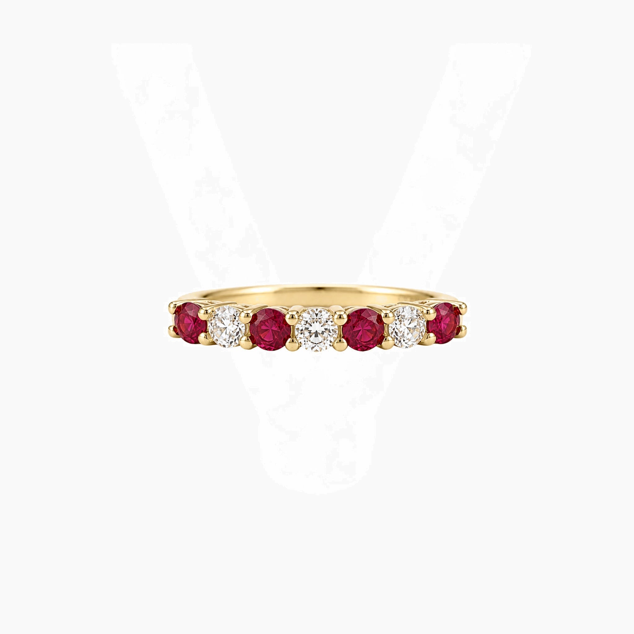 Moissanite and lab-grown ruby half eternity ring in yellow gold vermeil, front view.