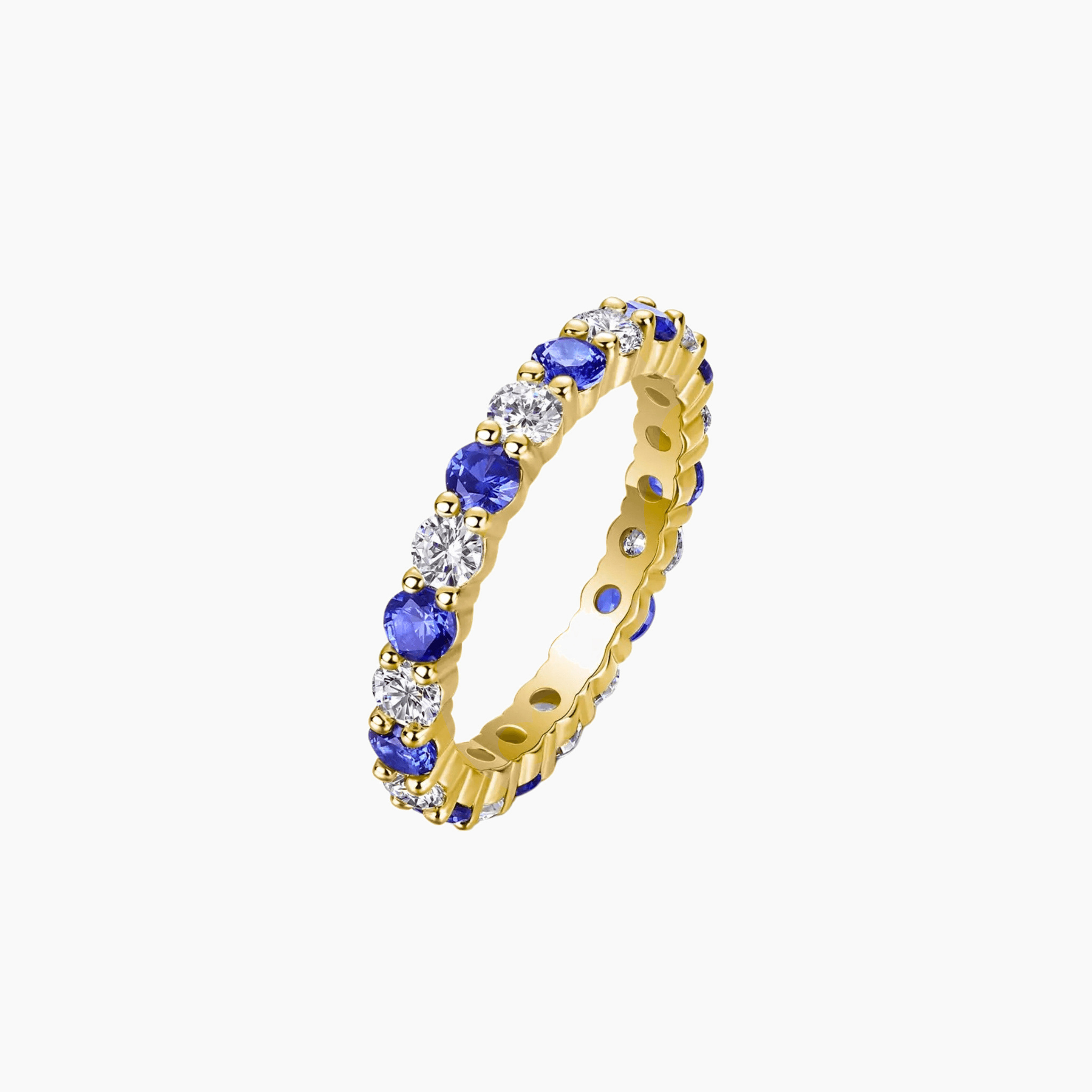 Moissanite and lab-grown sapphire eternity ring in yellow gold vermeil, front view.