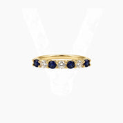 Moissanite and lab-grown sapphire half eternity ring in yellow gold vermeil, front view.