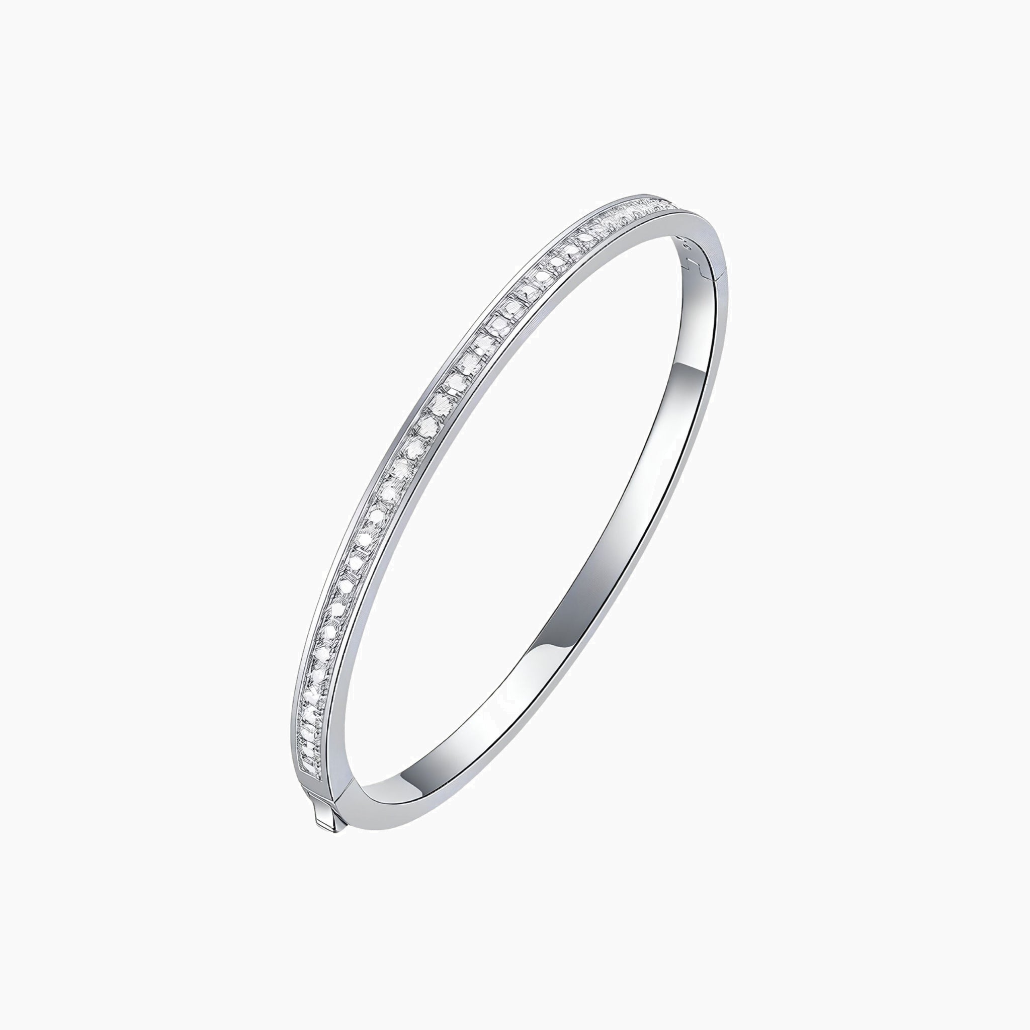 Moissanite bangle bracelet in white gold vermeil, angled view.