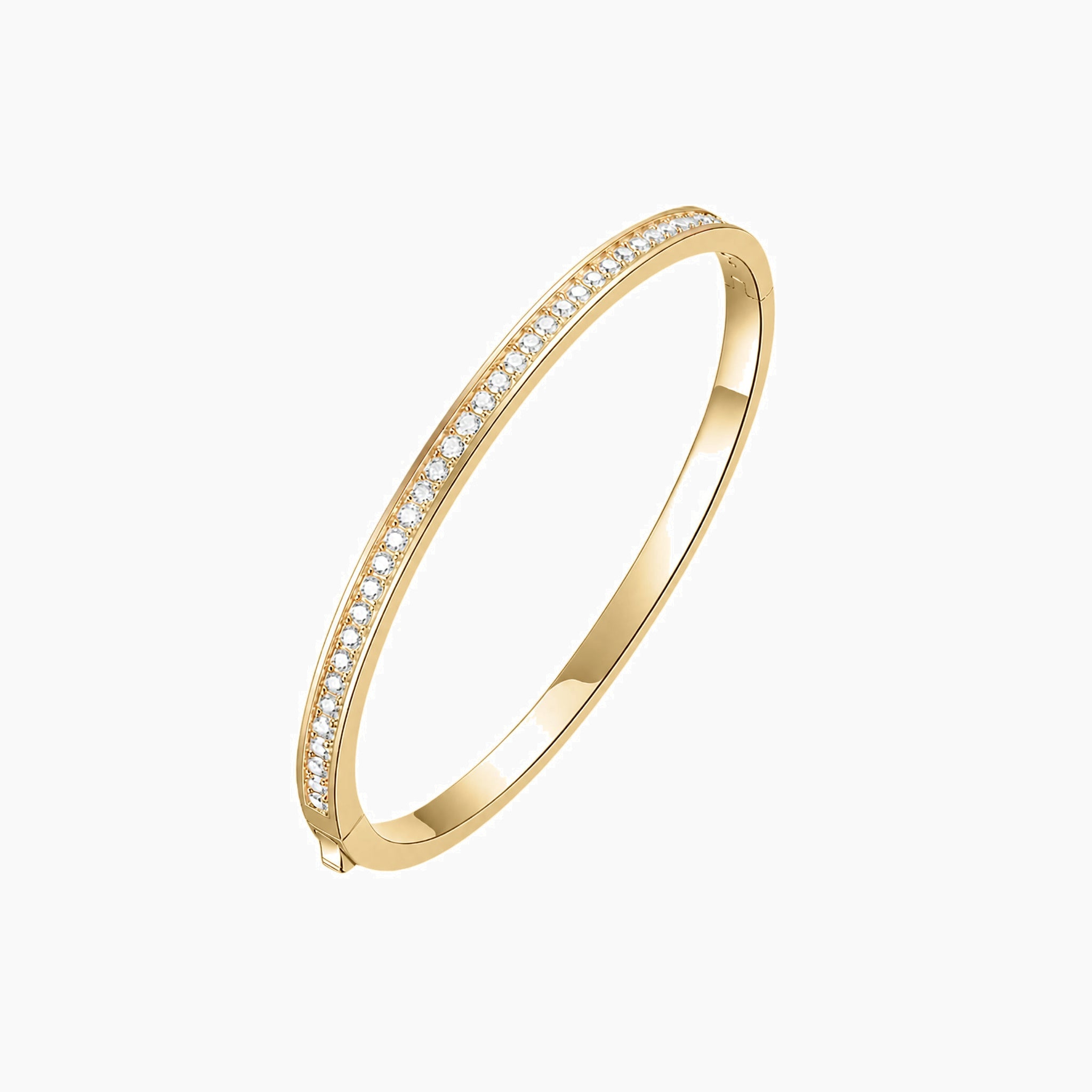 Moissanite bangle bracelet in yellow gold vermeil, angled view.
