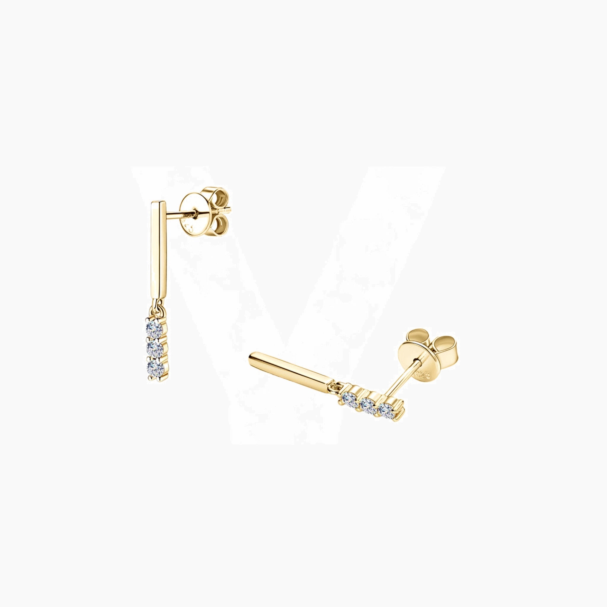Moissanite bar drop earrings in yellow gold vermeil, angled view.