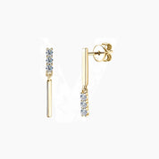 Moissanite bar drop earrings in yellow gold vermeil, front and side views.