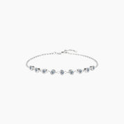 Moissanite bezel half tennis bracelet in white gold vermeil, full product view.