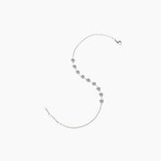 Moissanite bezel half tennis bracelet in white gold vermeil, open view showing the closure.