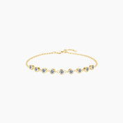 Moissanite bezel half tennis bracelet in yellow gold vermeil, full product view.