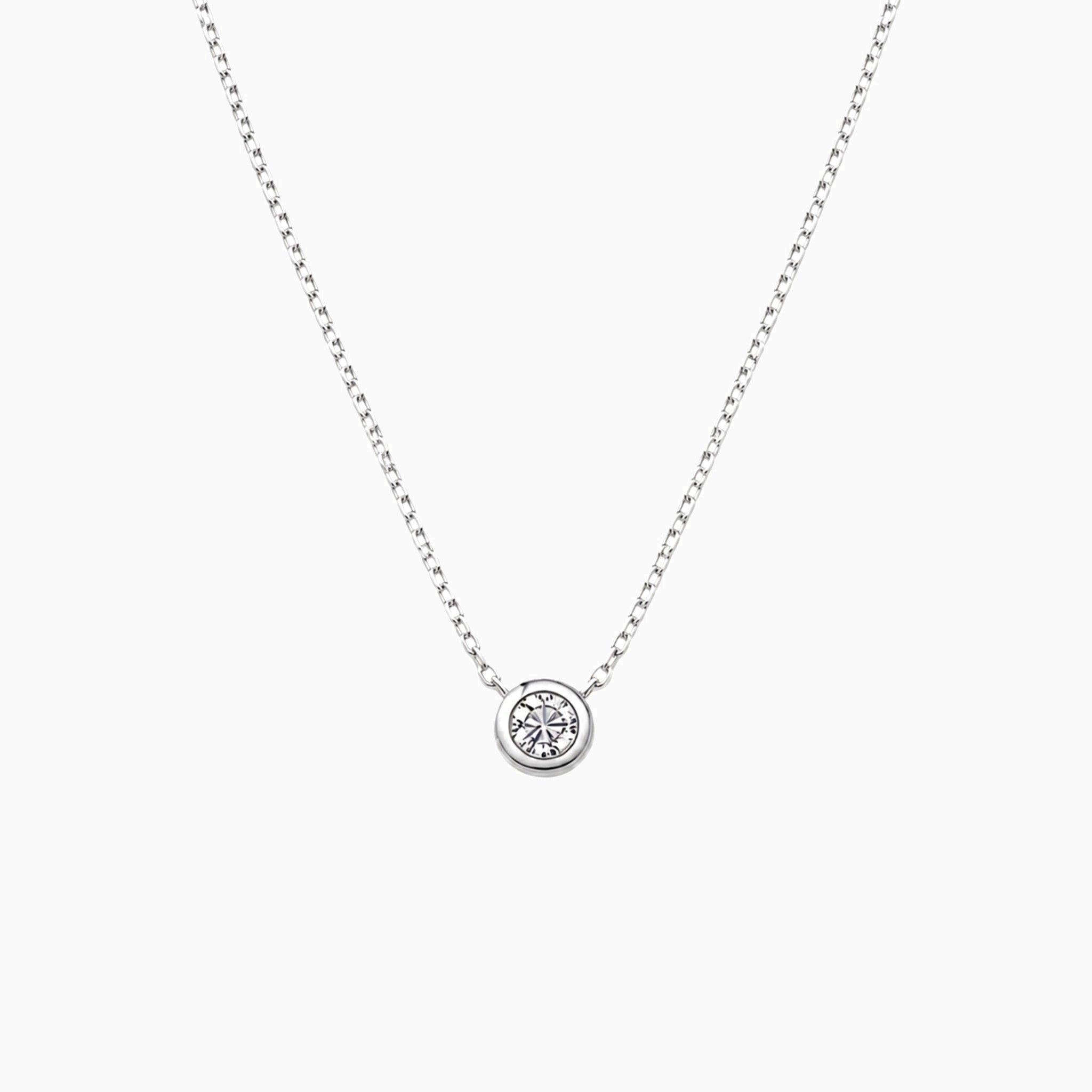 Moissanite bezel pendant necklace in white gold vermeil, front view.