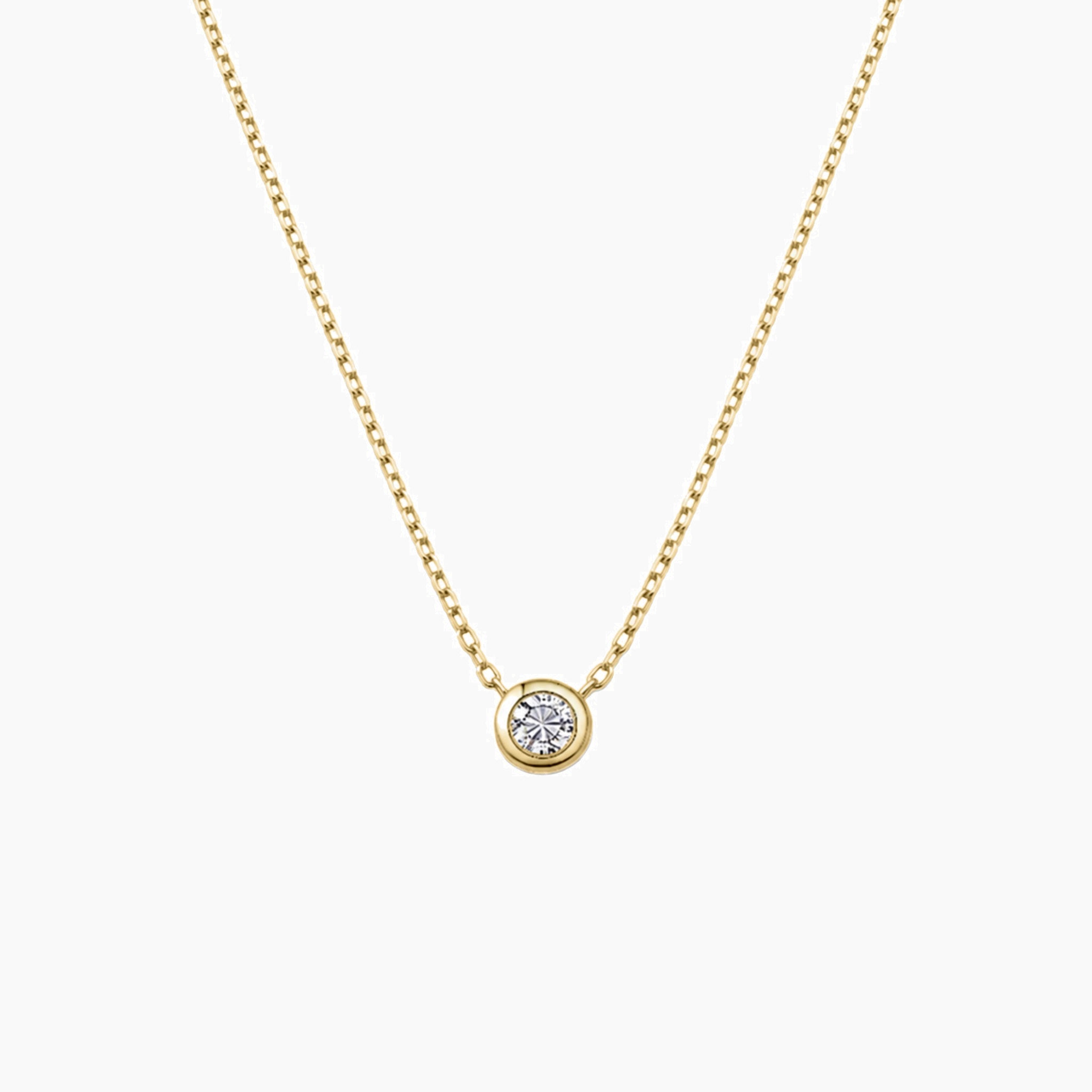 Moissanite bezel pendant necklace in yellow gold vermeil, front view.
