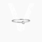 Moissanite bezel solitaire ring in white gold vermeil, front view.