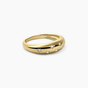 Moissanite celestial dome ring in yellow gold vermeil, angled view.