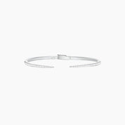 Moissanite claw cuff bracelet in white gold vermeil, full product view.