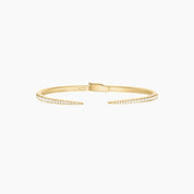 Moissanite claw cuff bracelet in yellow gold vermeil, full product view.