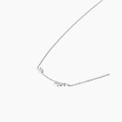 Moissanite cluster bar necklace in white gold vermeil, side view.