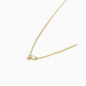 Moissanite cluster necklace in yellow gold vermeil, side view.