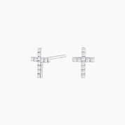 Moissanite cross stud earrings in white gold vermeil, front and side views.