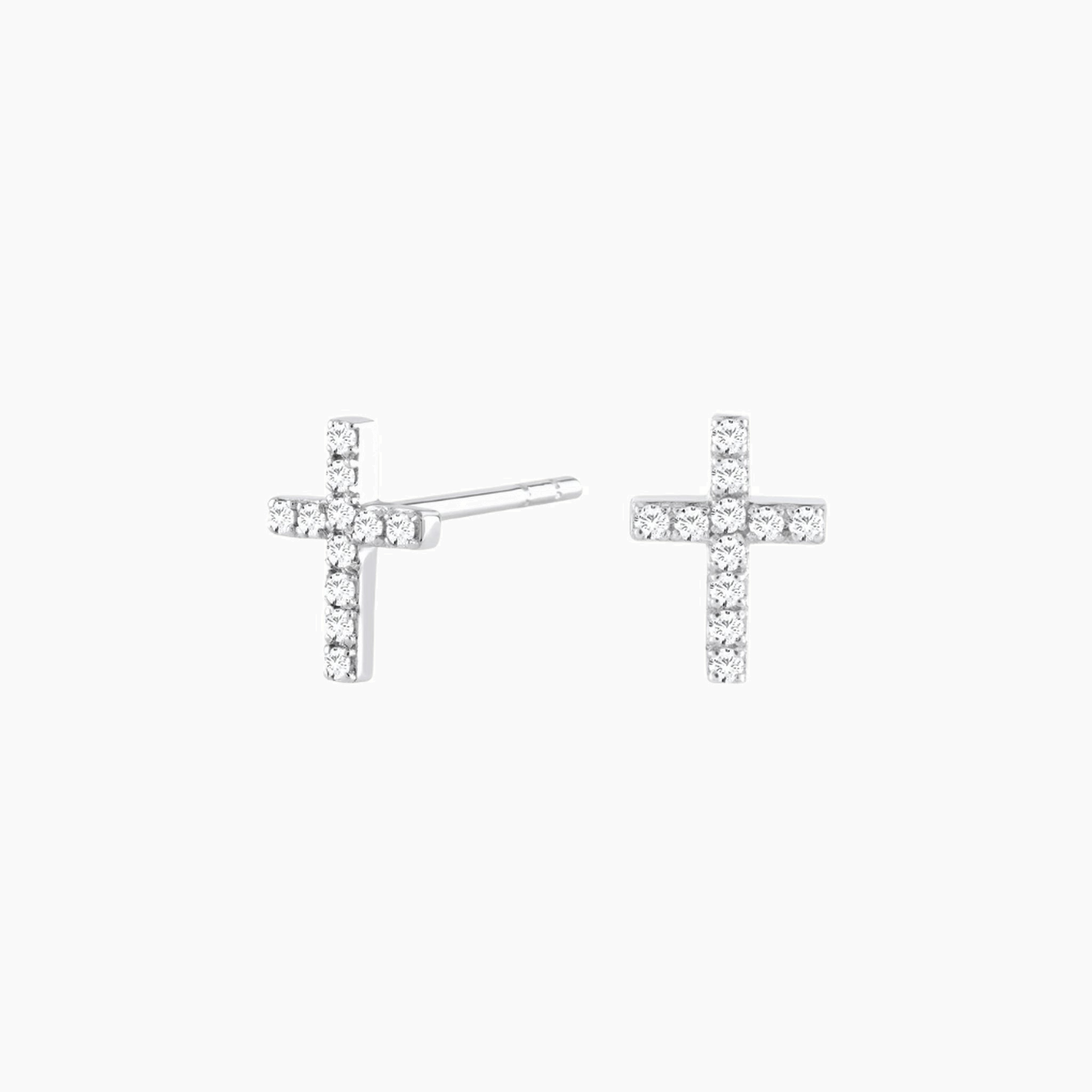 Moissanite cross stud earrings in white gold vermeil, front and side views.