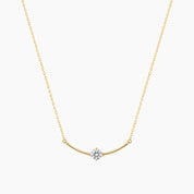 Moissanite curved bar solitaire necklace in yellow gold vermeil, full product view.