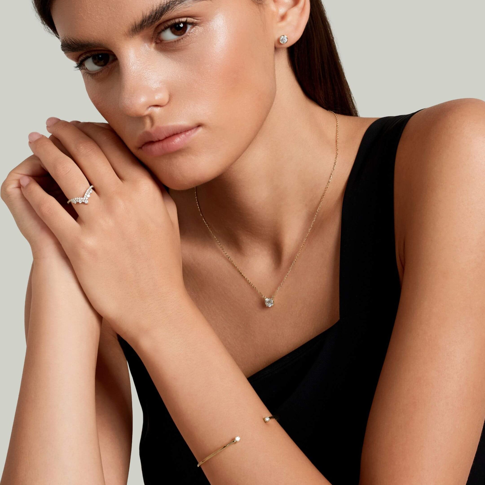 Moissanite flexible cuff bracelet worn on the wrist.