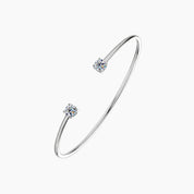 Moissanite flexible cuff bracelet in white gold vermeil, angled view.