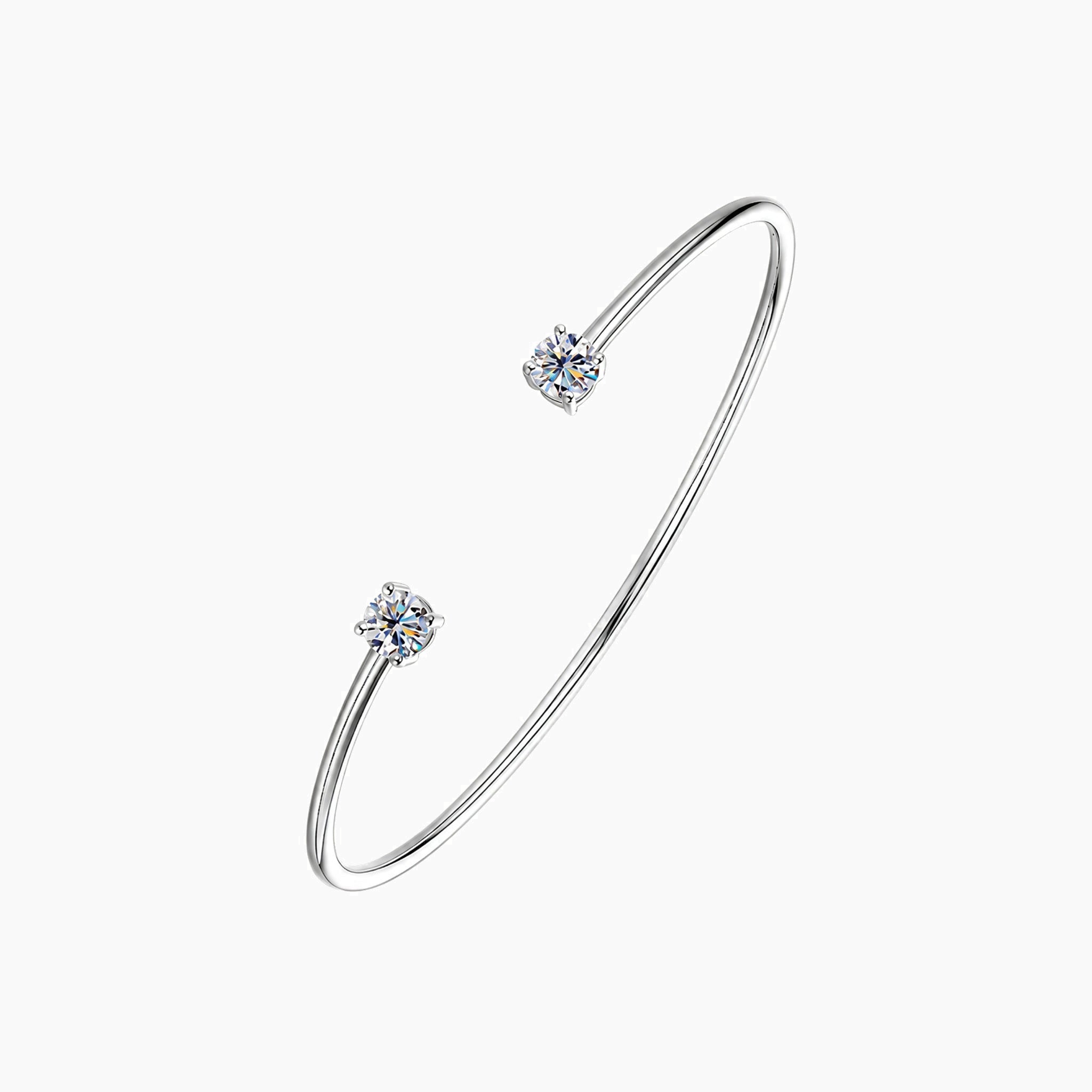 Moissanite flexible cuff bracelet in white gold vermeil, angled view.