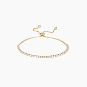 Moissanite half tennis bolo bracelet in yellow gold vermeil, full product view.