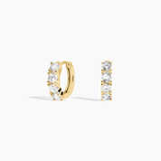 Moissanite huggie hoop earrings in yellow gold vermeil, front and side views.