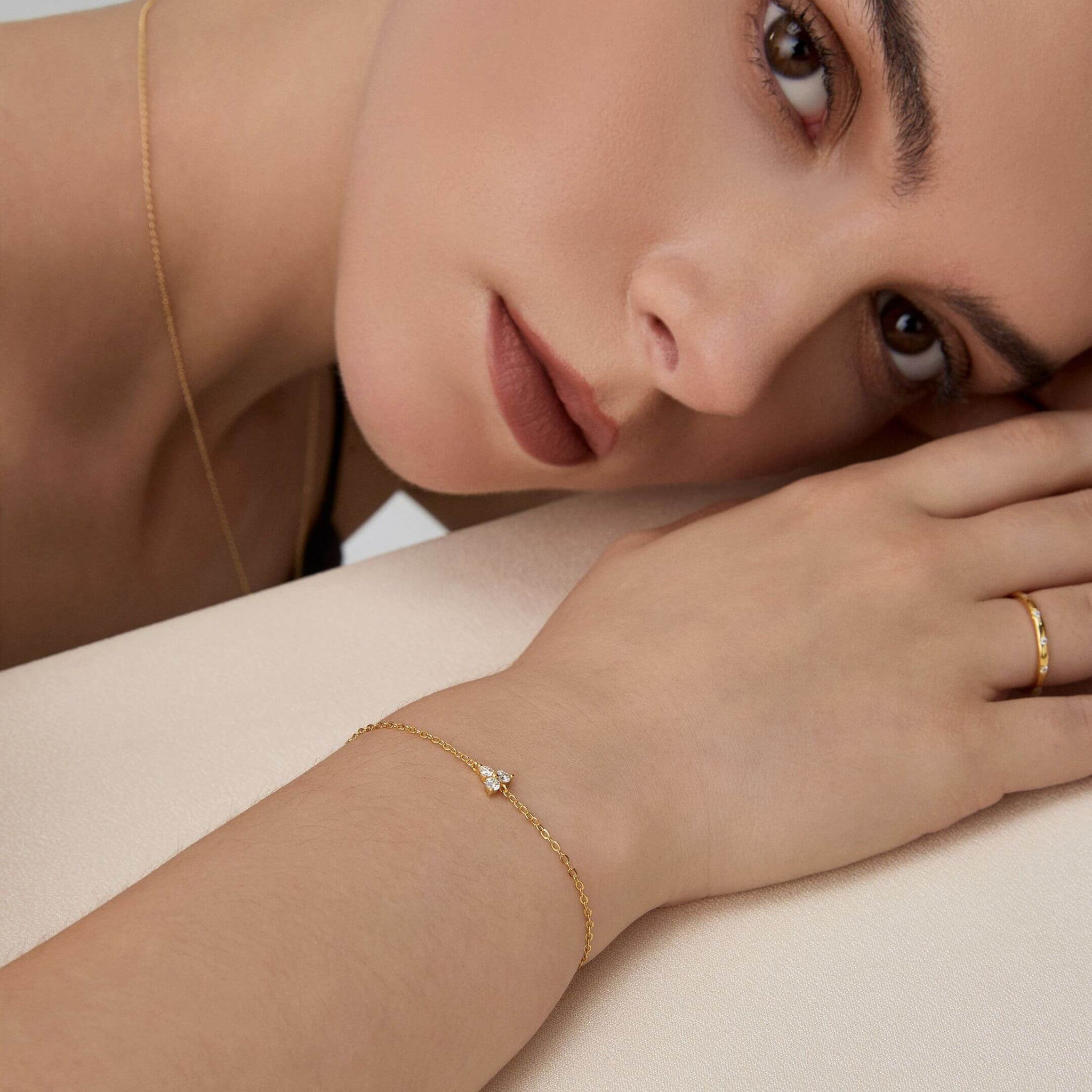Moissanite lotus bracelet worn on the wrist.