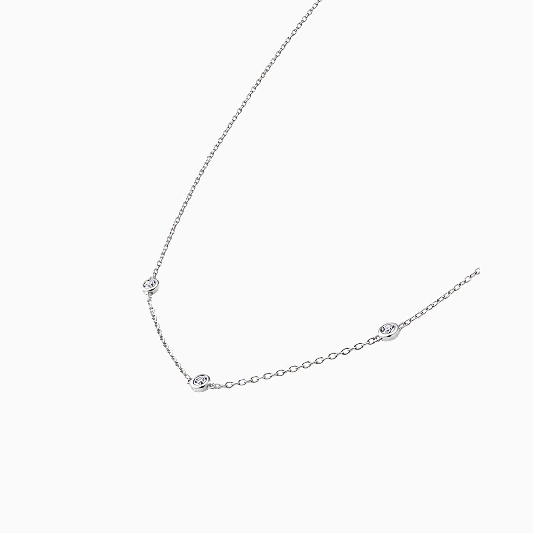 Moissanite satellite necklace in white gold vermeil, side view.