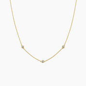 Moissanite satellite necklace in yellow gold vermeil, front view.