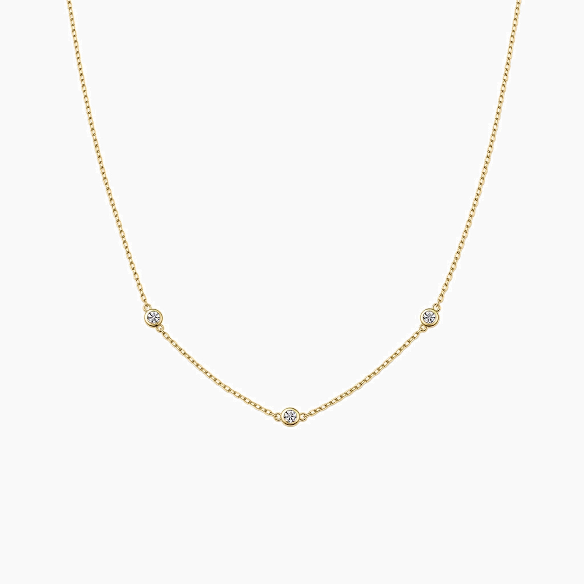 Moissanite satellite necklace in yellow gold vermeil, front view.