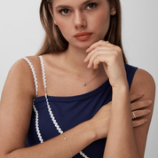 Moissanite solitaire bracelet worn on the wrist.