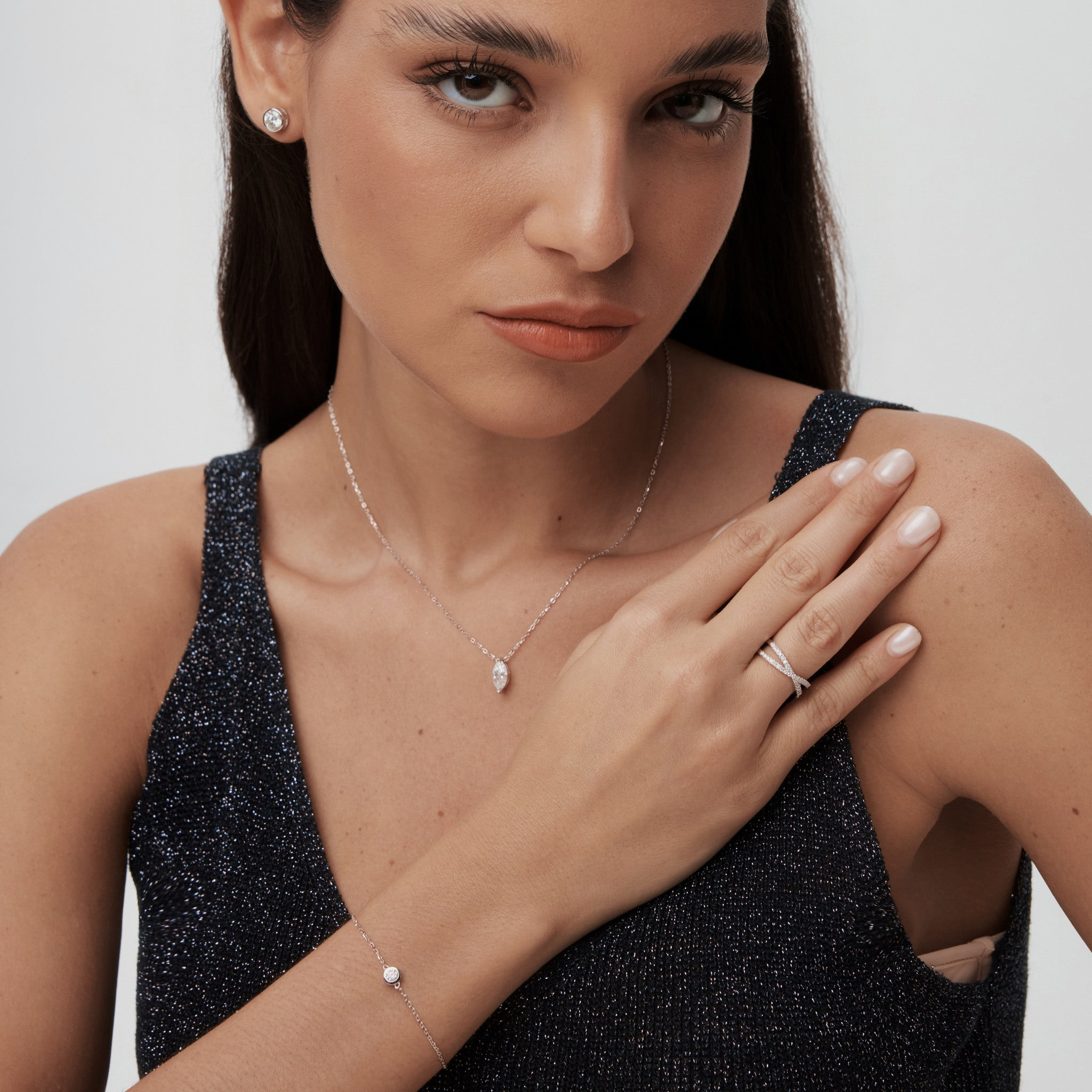 Moissanite solitaire bracelet worn on the wrist.